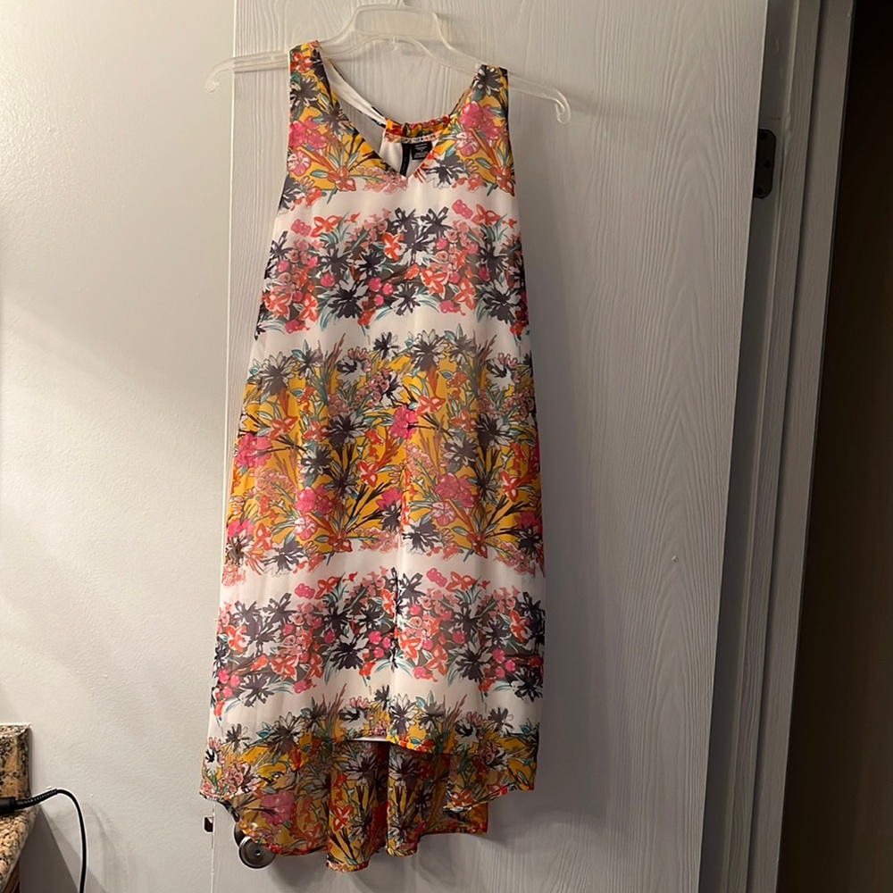 Medium asymmetrical dress, multicolored, light material, worn twice.